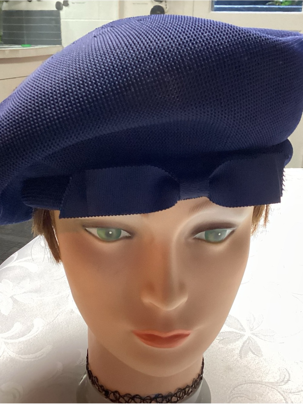 kANGOL. Classic Navy Women's Beret with Bow Accent